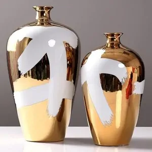 Gold and White Ceramic Vase with Modern Design